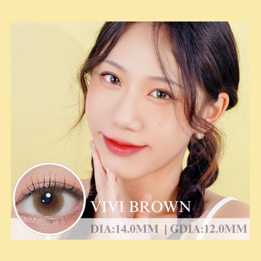 Woman with brown hair and makeup, wearing VIVI BROWN contact lenses